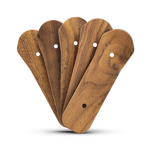 The TIMBR Buttstock Spacer Kit offers customizable length of pull with five walnut hardwood spacers, enhancing comfort and style for your XRS or ORYX Chassis.