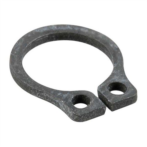 Enhance your Remington 1100/11-87 with the Brownells Interceptor Latch Retainer, oversized to reduce latch wobble and improve feeding reliability.