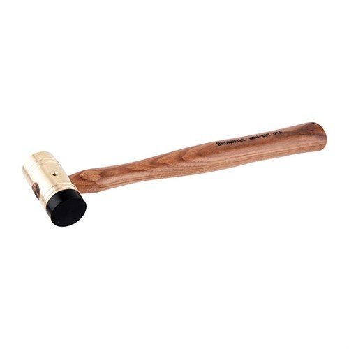 The Brownells Premium Delrin-Tipped Brass Hammer features a dual-function head, ergonomic hickory handle, and replaceable Delrin tip for versatile, precise gunsmithing.
