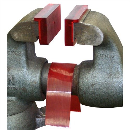 Securely hold your firearms with WAGNER INDUSTRIES INC Standard Soft Jaws, featuring durable molded polyurethane for a firm grip and protection.