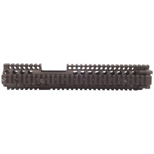 The Daniel Defense RIS II handguard offers a robust aluminum design, full-length Picatinny rails, and M203 compatibility, ensuring versatility and barrel free-float.