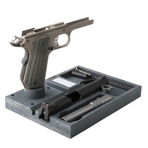 The Present Arms 1911 Armorer Plate with MP-1A Mag Post securely holds your 1911 for disassembly, cleaning, and repairs, ensuring operational readiness.