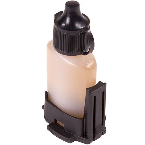 The Magpul MIAD/MOE Lube Bottle Core securely holds a ½ oz. reusable lubrication bottle, compatible with various MIAD and MOE grips for convenient maintenance.