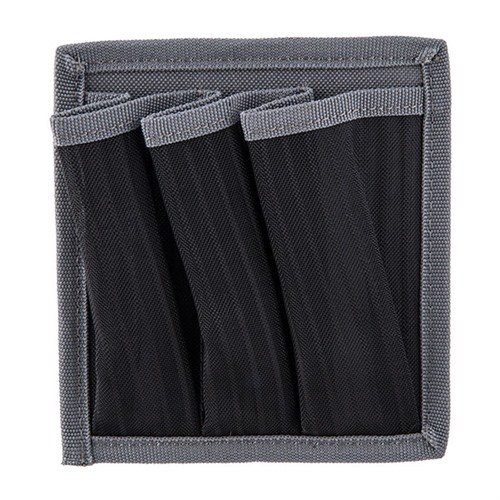 The G.P.S. Universal Magazine Holder features Hook and Loop backing for carpeted safes and a magnetic option for metal safes, accommodating common shooting accessories.