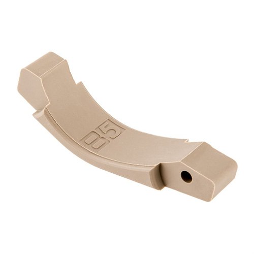 Upgrade your AR-15 with the B5 Systems Trigger Guard, featuring an enlarged profile for glove use, retaining original swing down function, and easy set screw attachment.