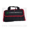 The TANDEMKROSS TandemKase Pistol Bag features a padded interior, adjustable strap, secure magazine pockets, and bright muzzle direction arrows for safe handling.