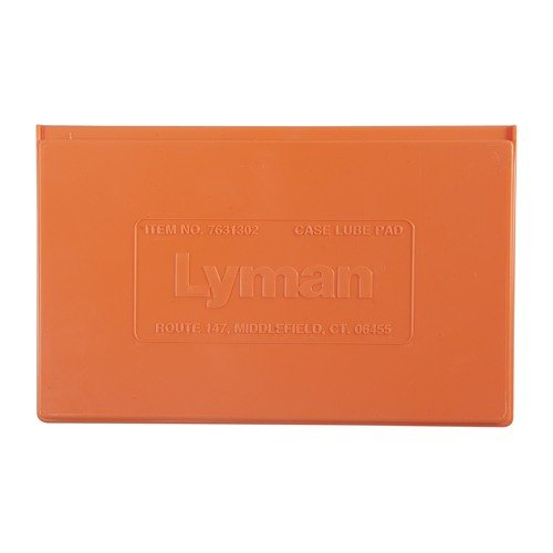 Lyman's Case Lube Kit includes a large lubrication pad, 2 fl. oz. of Case Lube, and an ergonomic handle with interchangeable neck brushes for easy reloading.